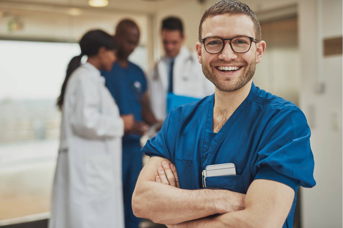 A nurse works in the progressive care unit.