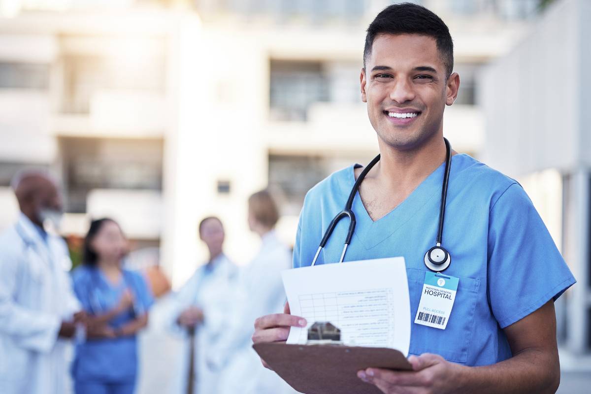 A nurse works on his Colorado nursing license renewal.