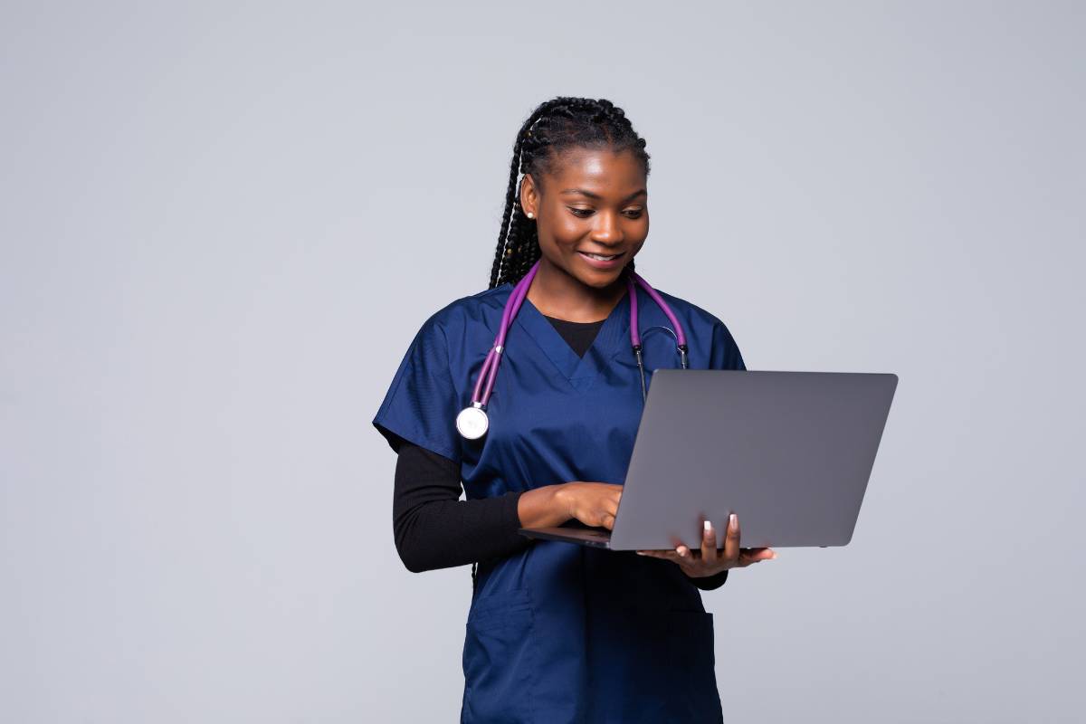 A nurse works on her Delaware nursing license renewal process.