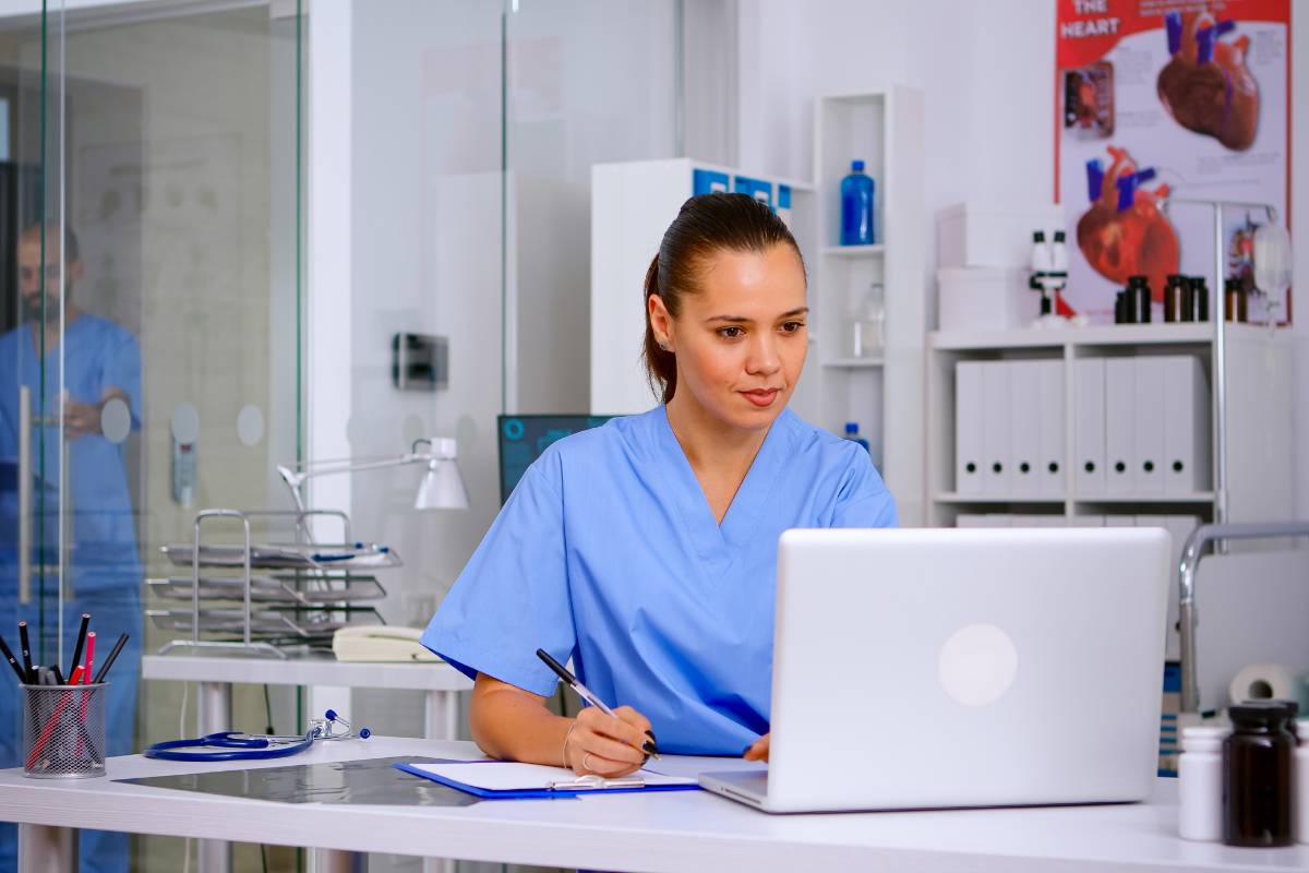 A nurse works on her Louisiana nursing license renewal process.