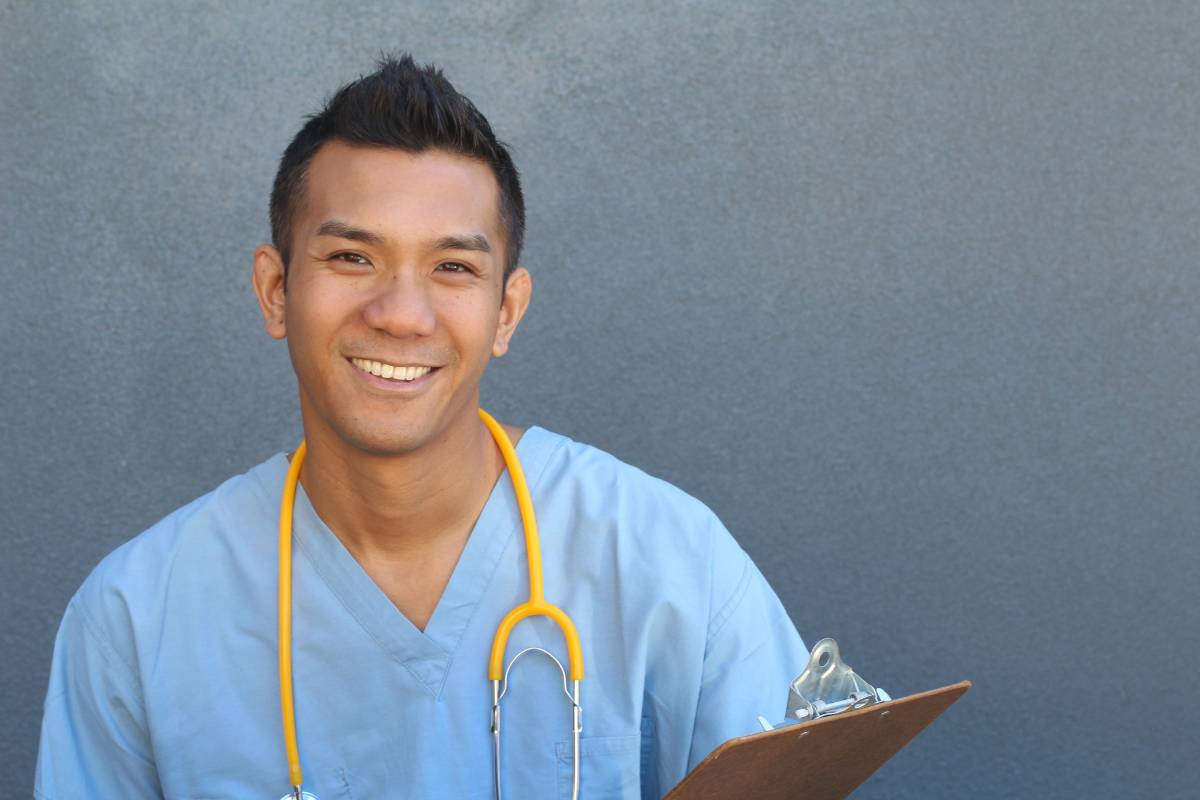 A nurse prepares his oncology nurse resume.