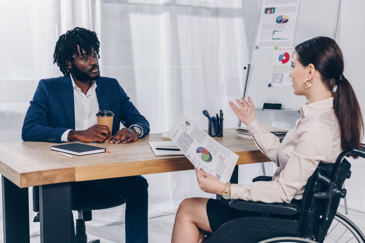 A nurse meets with a healthcare recruiter about open positions.