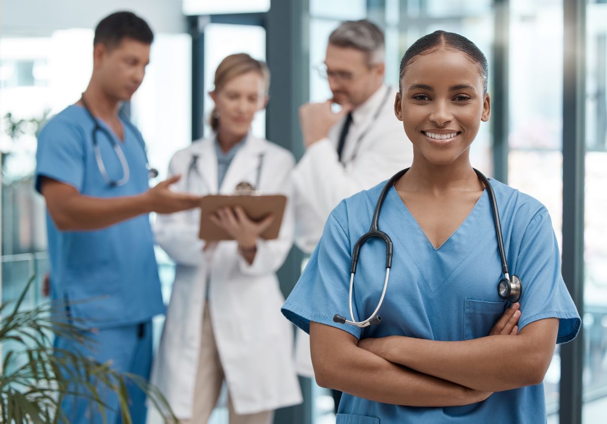 Nurse manager in a medical facility smiling for the camera