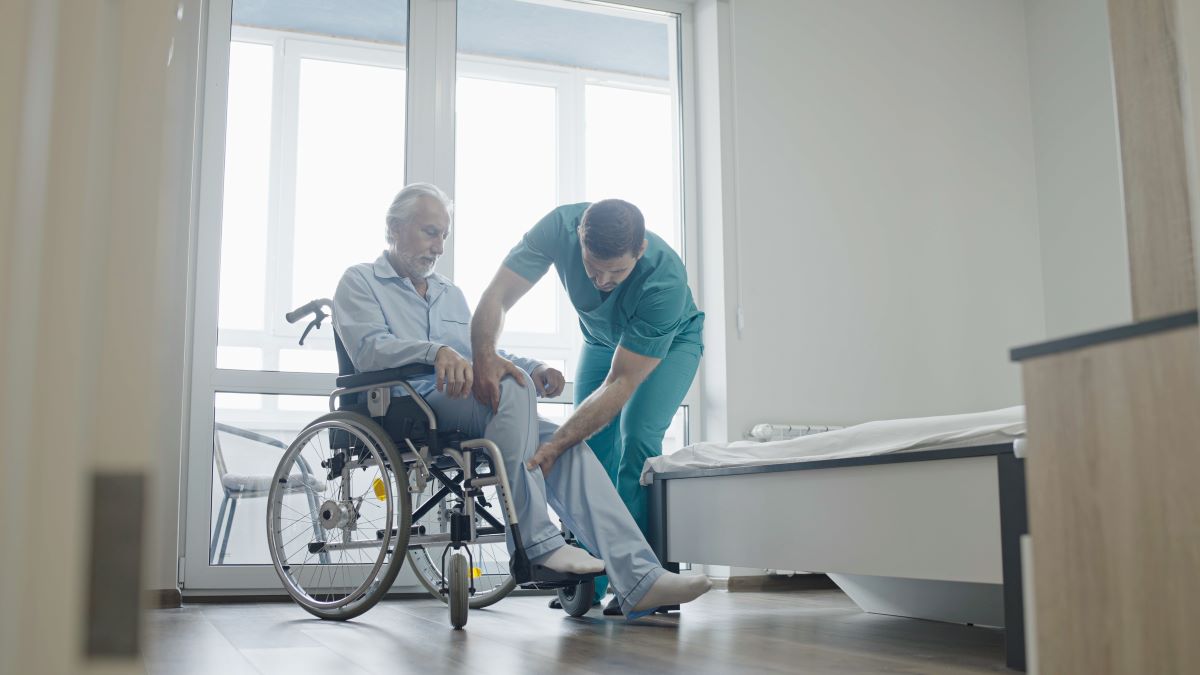 A nurse assesses a patient with dementia.