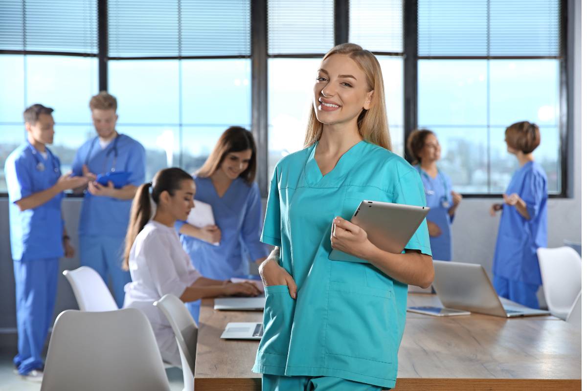 A nurse uses their nurse educator resume skills to teach clinical techniques.