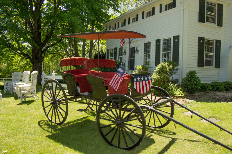 Carriage on display during a yard sale in Sharon, CT.