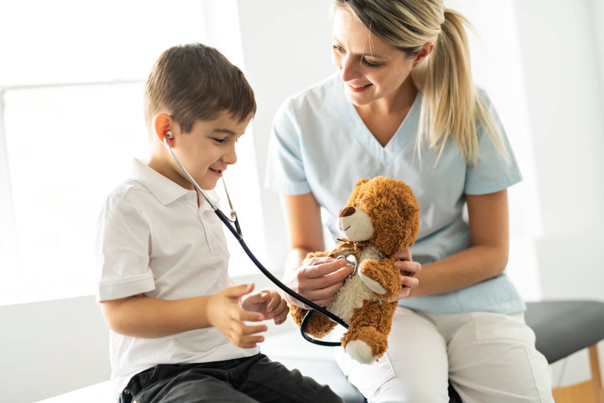 A nurse uses their PNCB certification skills when working with a pediatric patient.