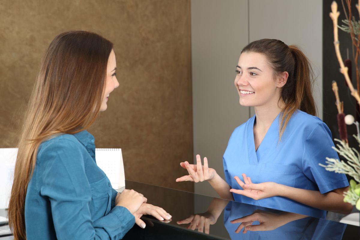 An aesthetic nurse consults with a patient.