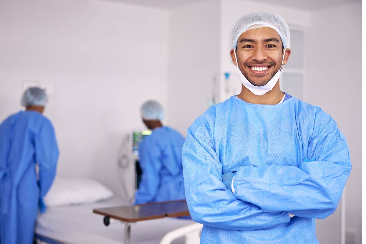 A STICU nurse prepares to care for a patient.