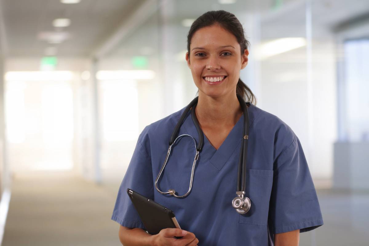 A nurse with AAHIVS certification prepares for her shift.