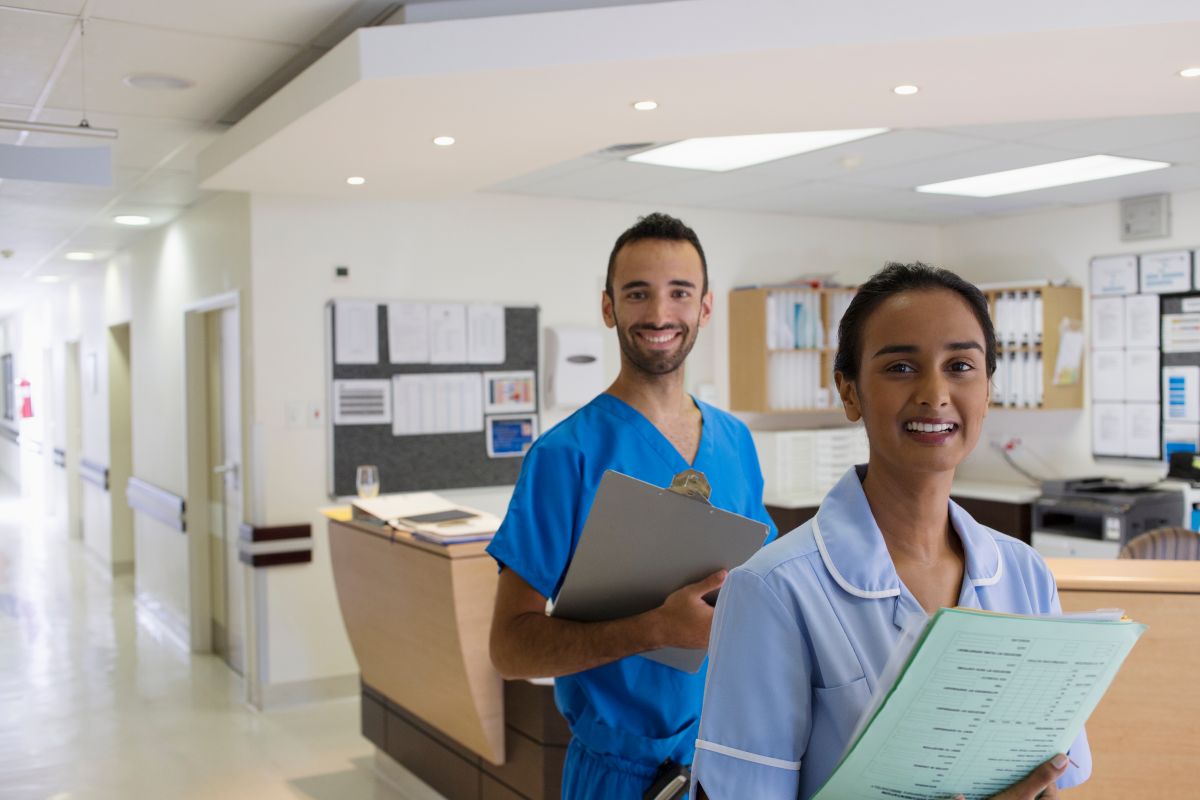 Delaware nurses in a hospital, smiling for the camera.