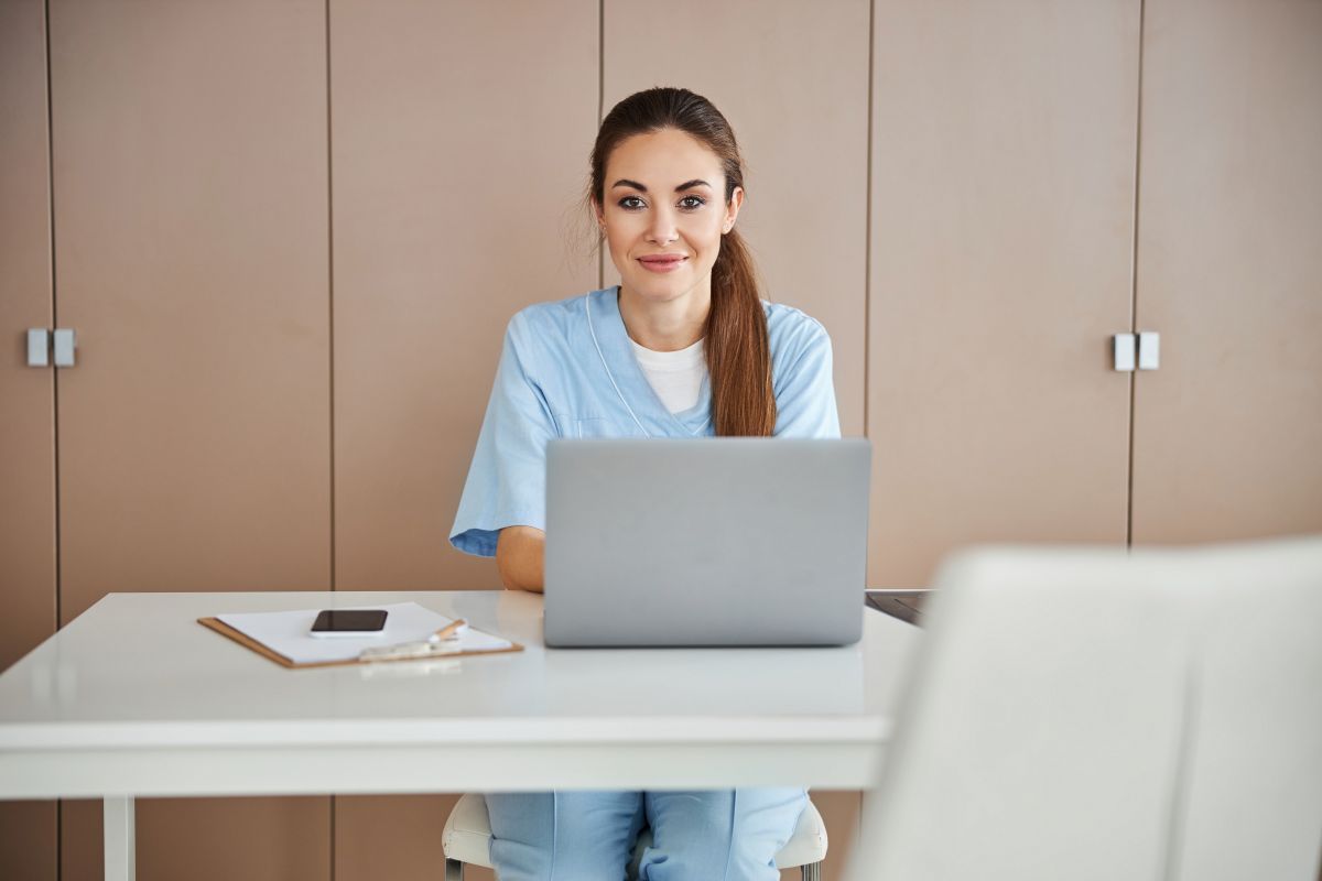 A new nurse goes through the orientation process and fills out tax forms.