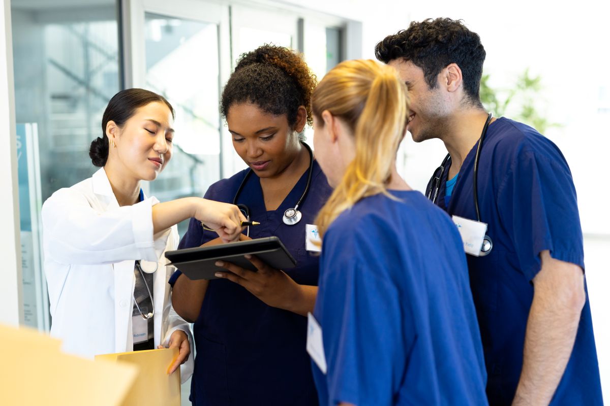 Nurses in West Virginia meet with a physician.