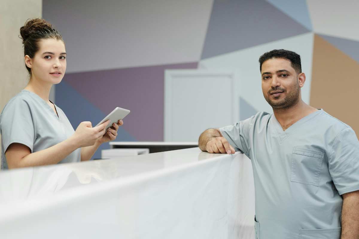 Medical assistants at a reception desk