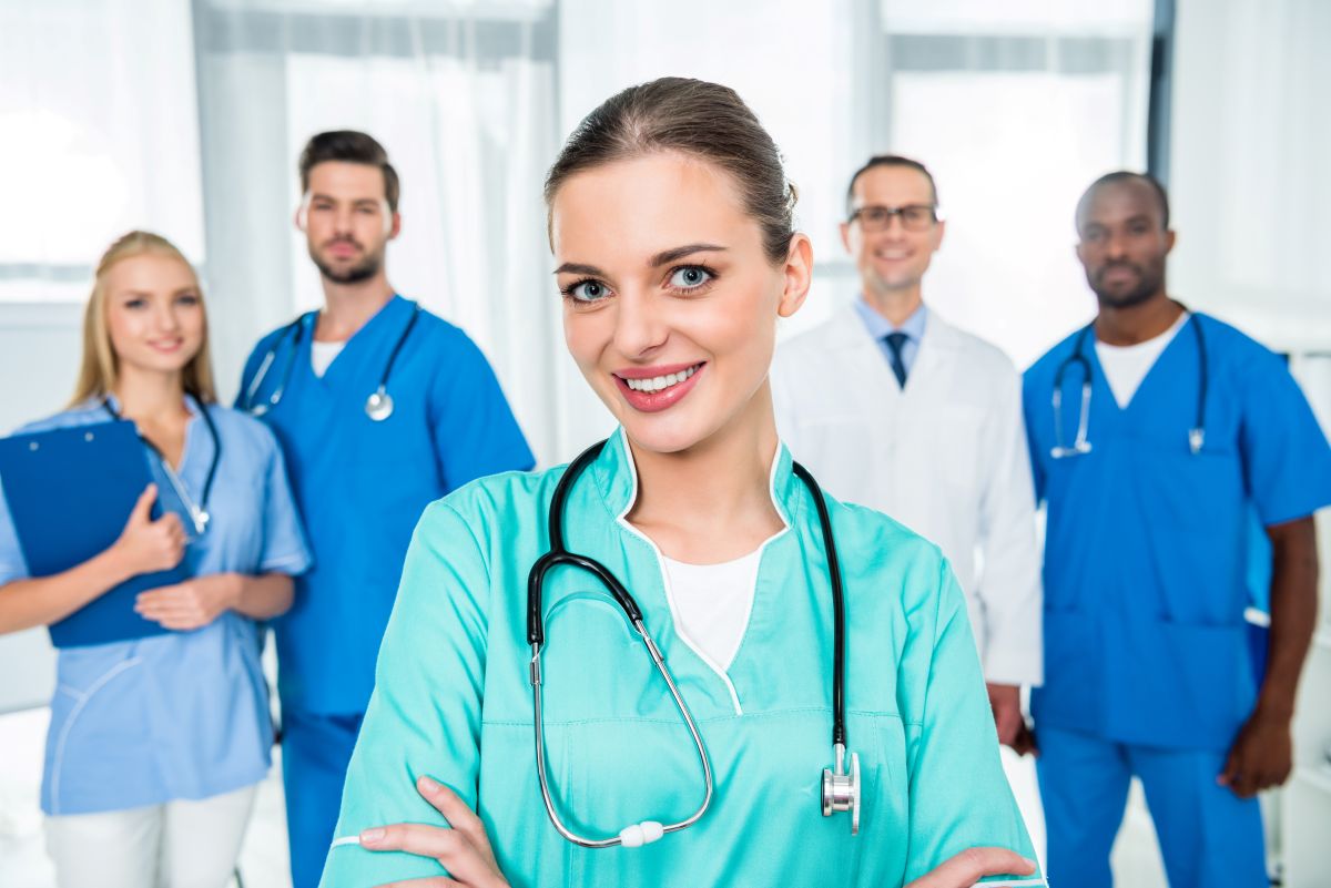 Tennessee nurses stand and pose for the camera.